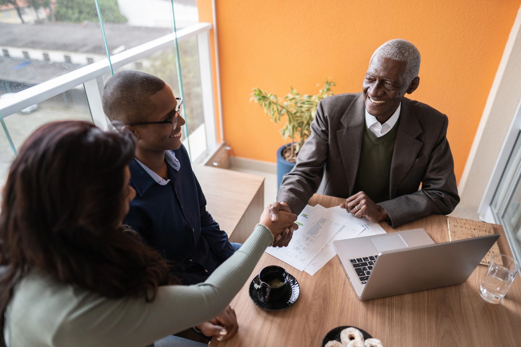 Black family meeting with a financial advisor